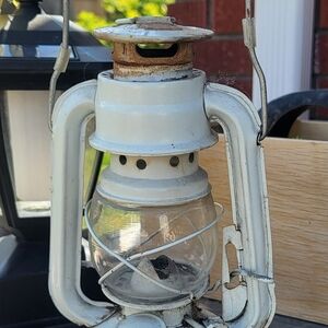 Vintage White Lantern. Oil Outlasts Candles.
